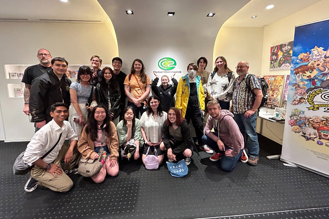 group of college students posing for a photo.