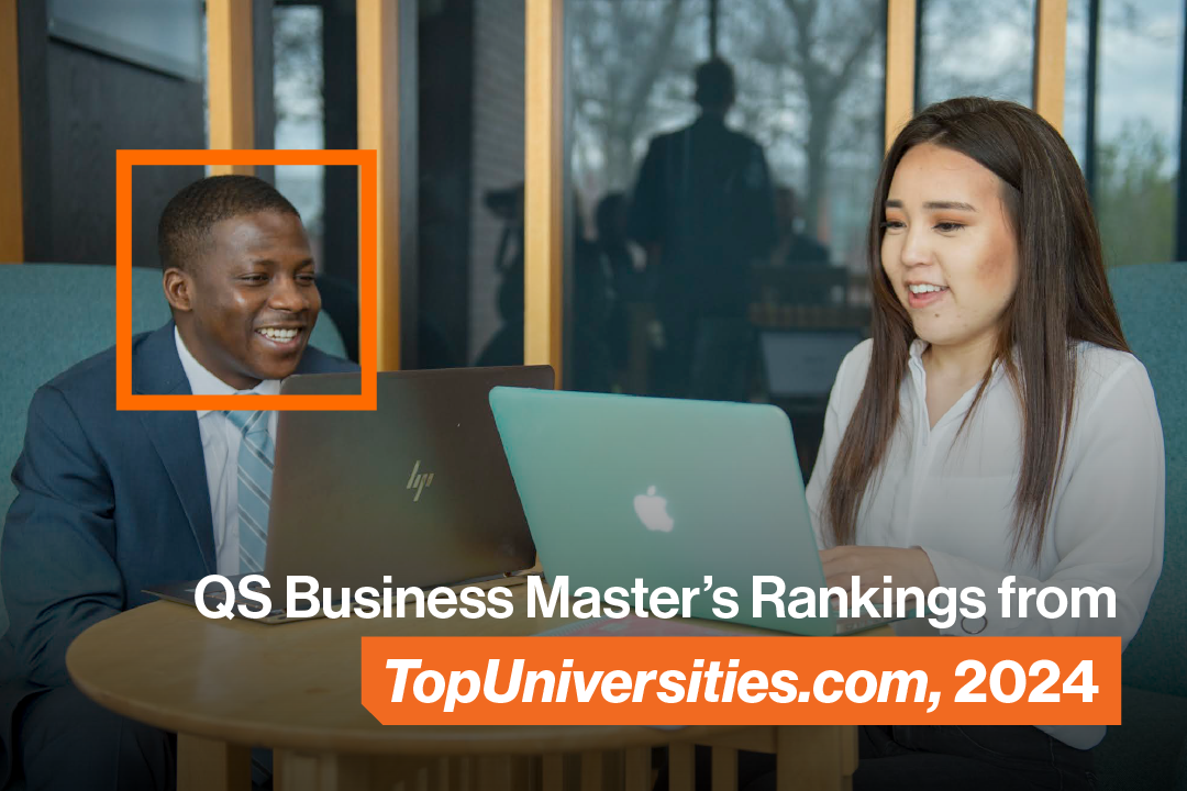 Students sitting on computers with text that says QS Business Master's Rankings from TopUniversities.com