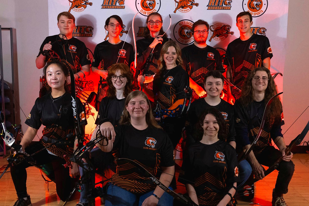 the RIT archery team is seen together as a group for a photo