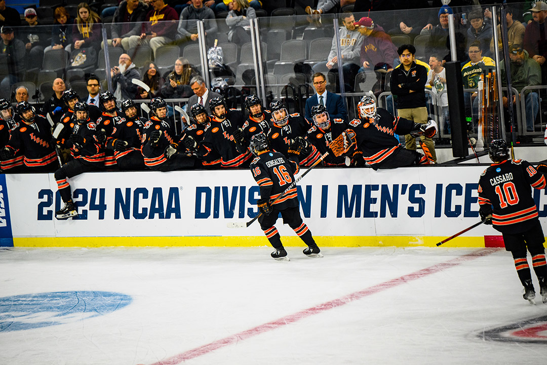 The RIT men's hockey team is shown in their blacks at the NCAA Division I tournament in Sioux Falls.