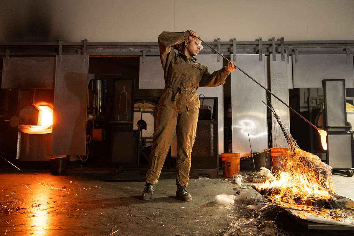 Spider Martins leads a performance in RIT's glass hot shop.