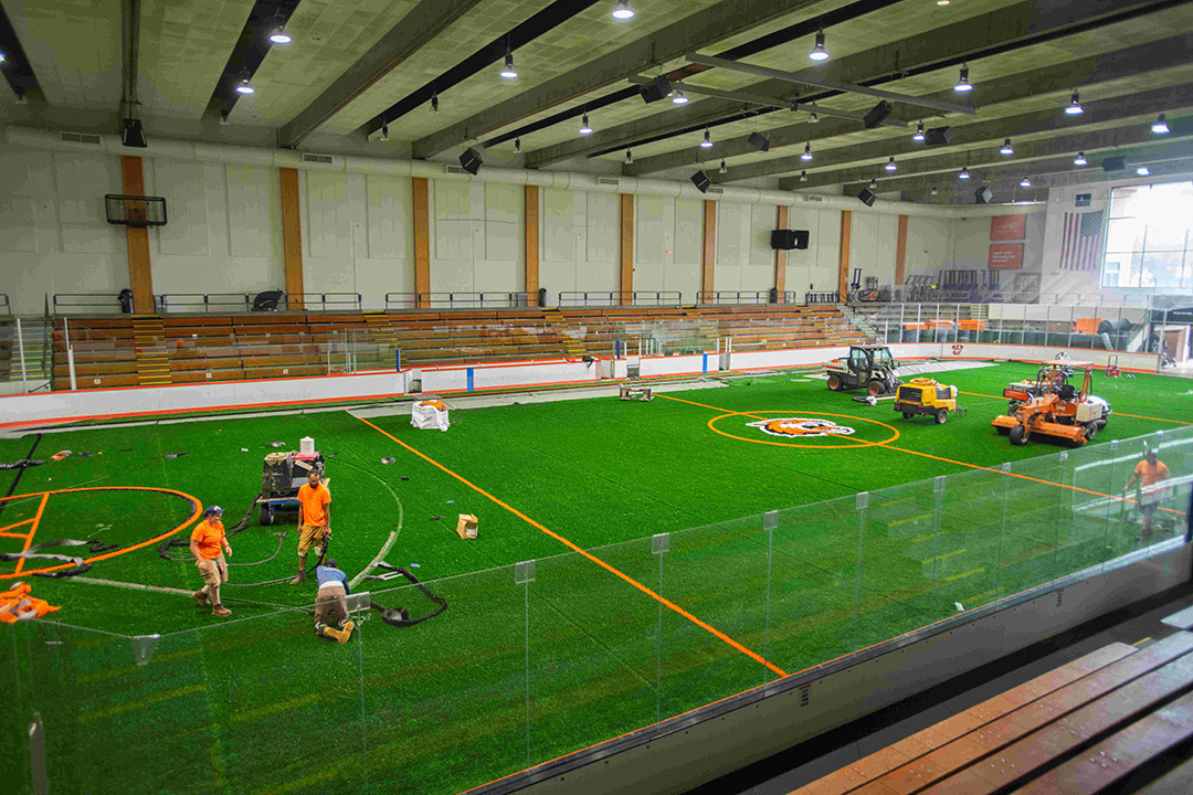 a birds eye view of an indoor lacrosse field.