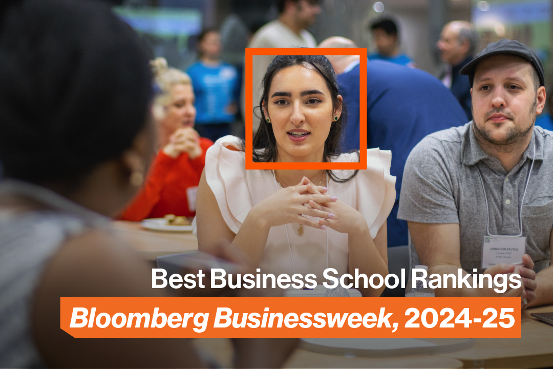 Woman in classroom with Best Business School Rankings Bloomberg Businessweek, 2024-25 text