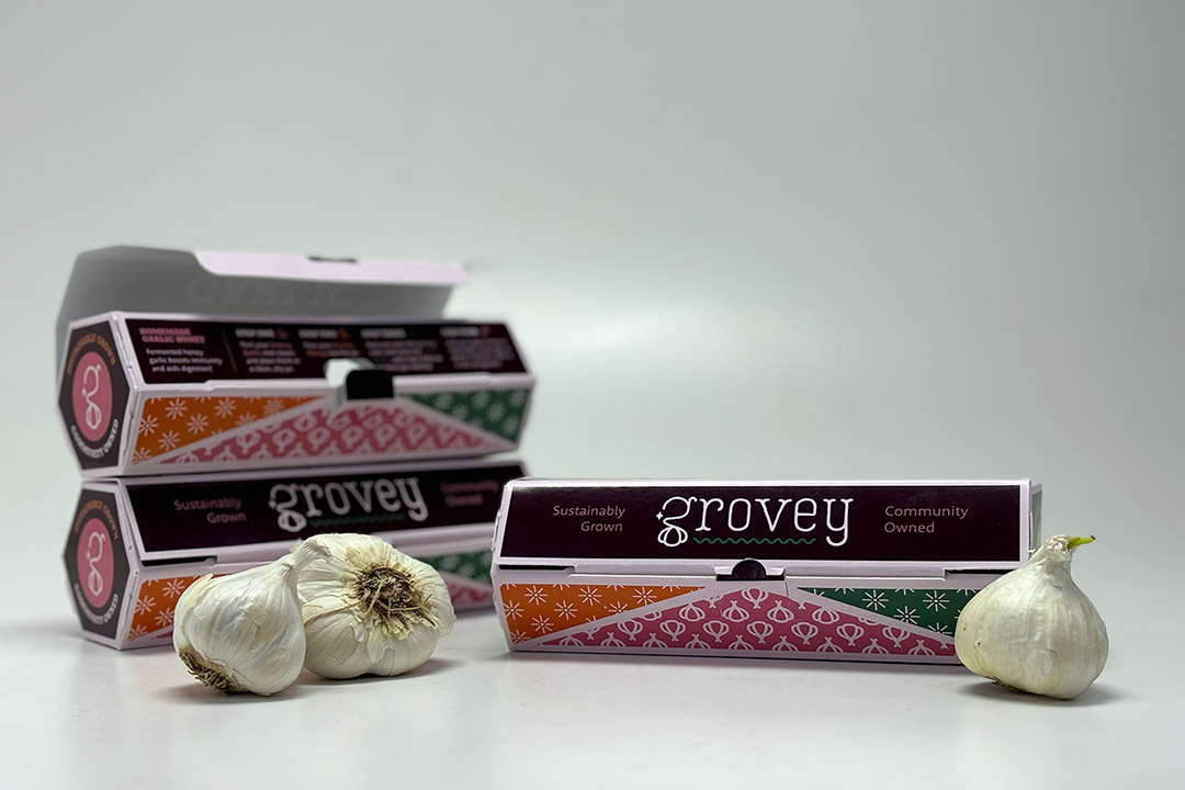 'heads of garlic are shown with new polygonal packaging.'