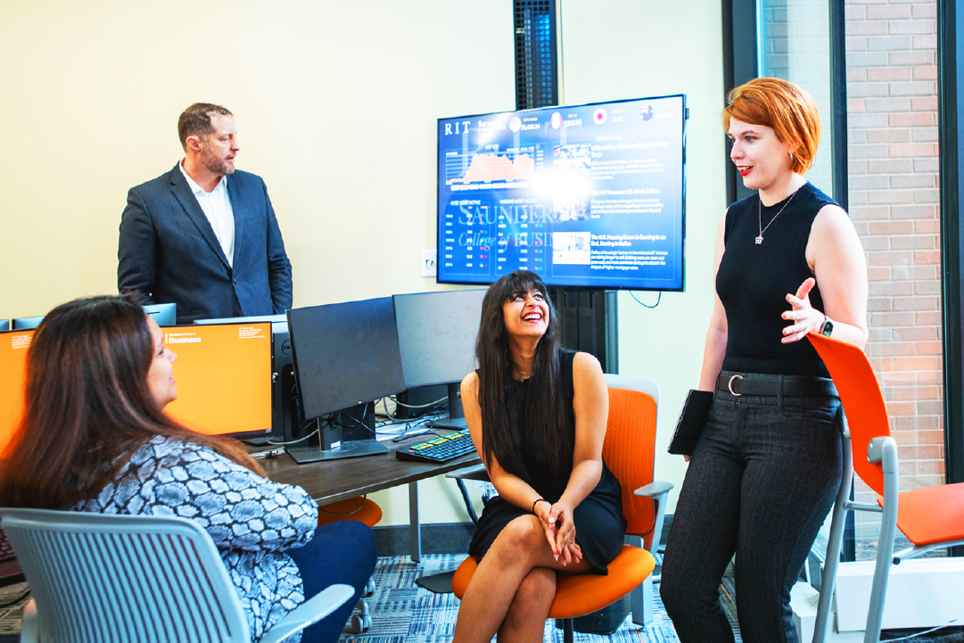 Students and professors in the Sklarsky Center for Business Analytics