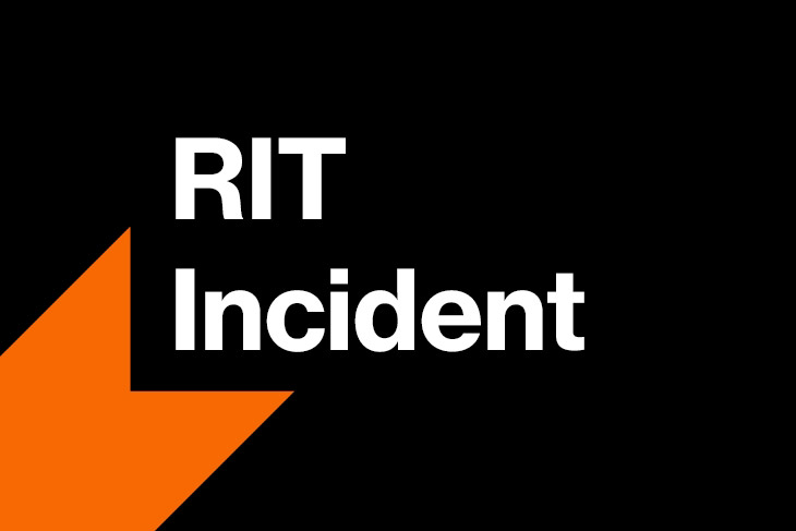 a black background with R I T incident in white letters