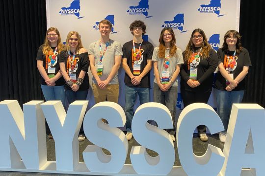 a group of communication students at the NYSSCA conference