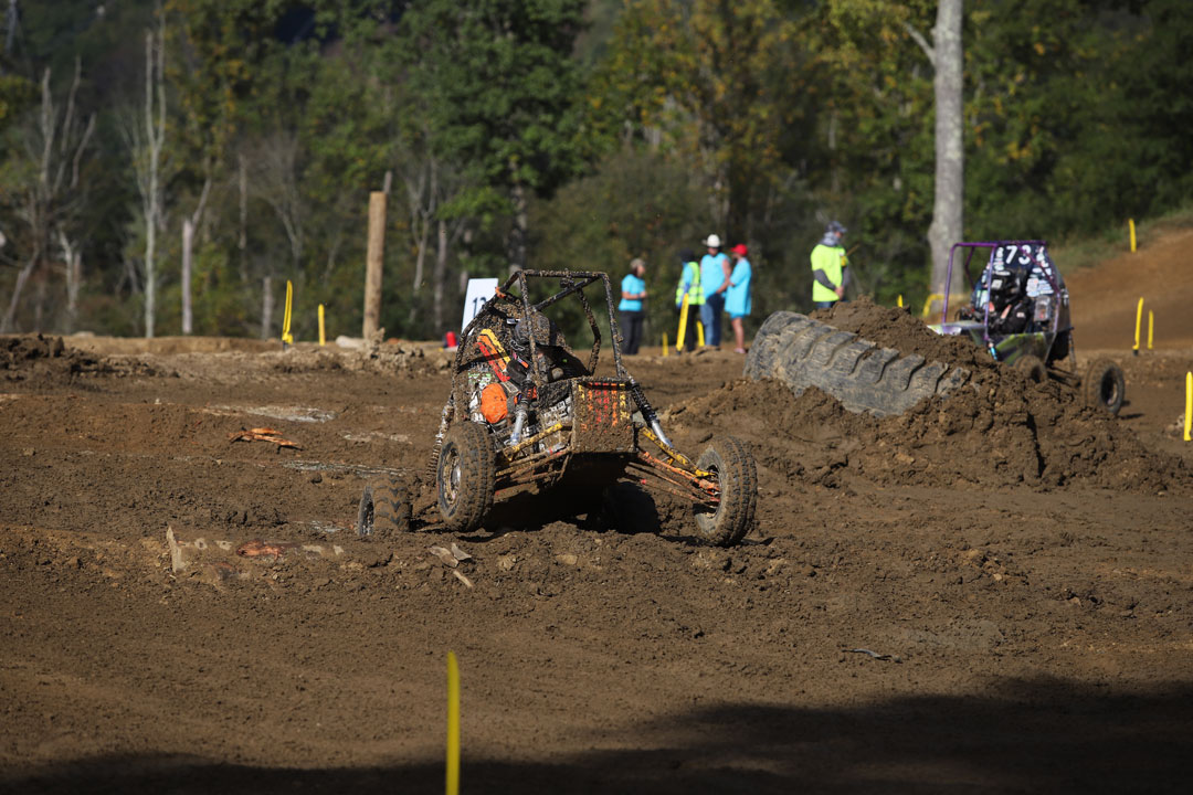 RIT’s Baja team vehicle, driven by fifth-year electrical engineering student Nick Lee, battles through obstacles during the SAE event in Ohio. 