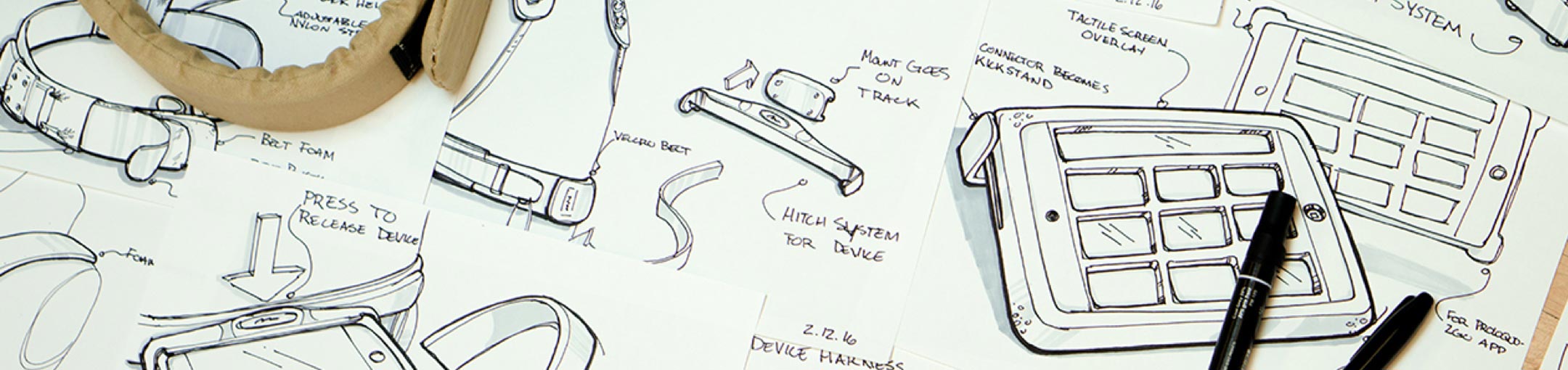 Sketches for a belt/hitch system for a tech device.