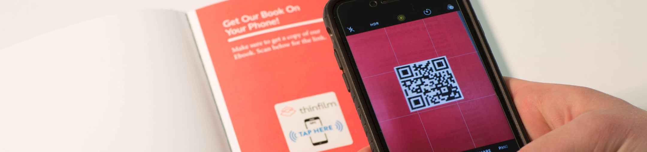 View of a cellphone scanning in a QR code
