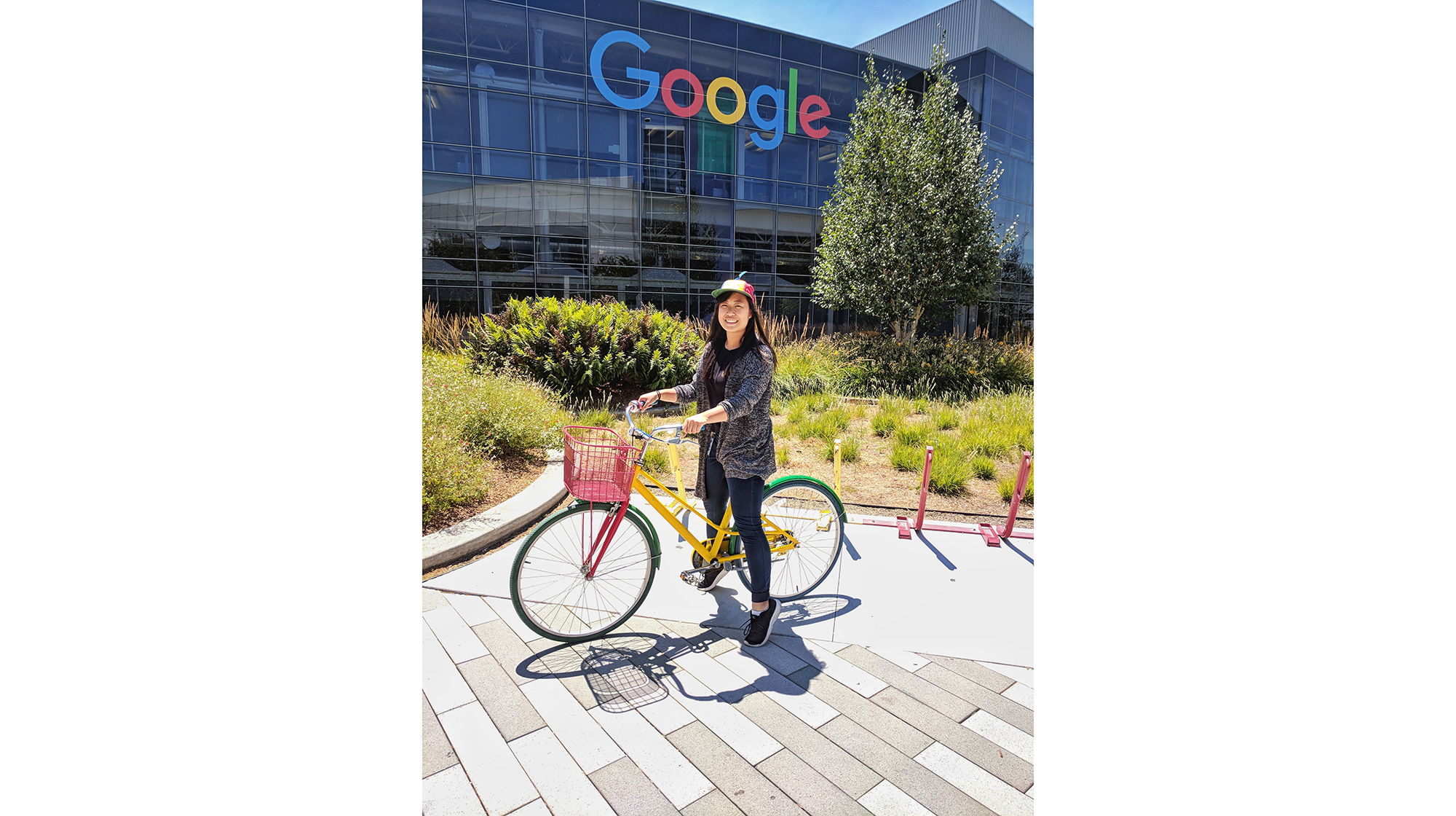 Ethelia Lung on a bike in front of Google