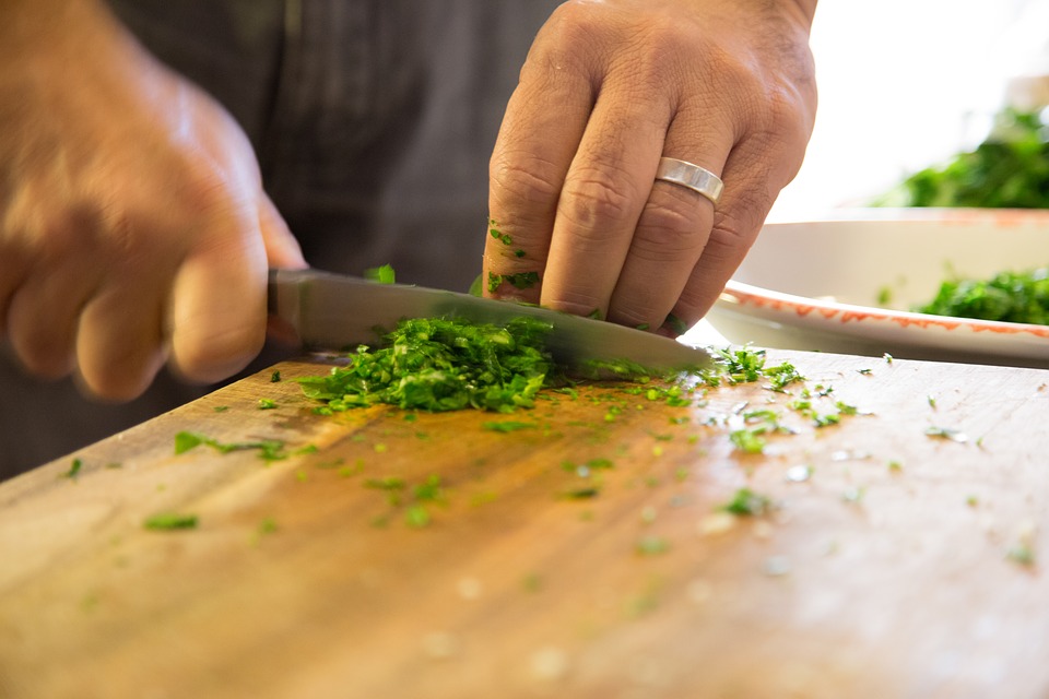 Person cutting herbs