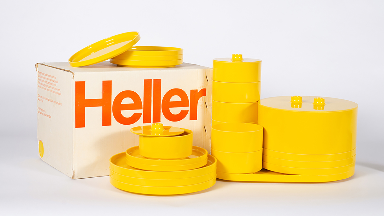 A set of yellow dishes archived in the Vignelli Center.