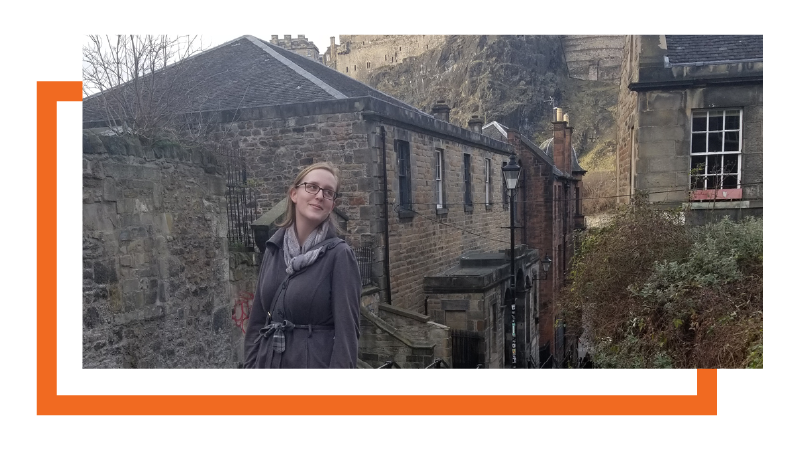 Stephanie Beach-Malony standing in front of the Edinburgh Castle in Scotland