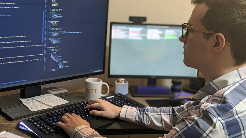 Spencer Richman working on a computer