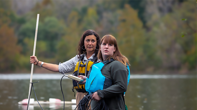 Christy Tyler with student at the RIT Tait Preserve