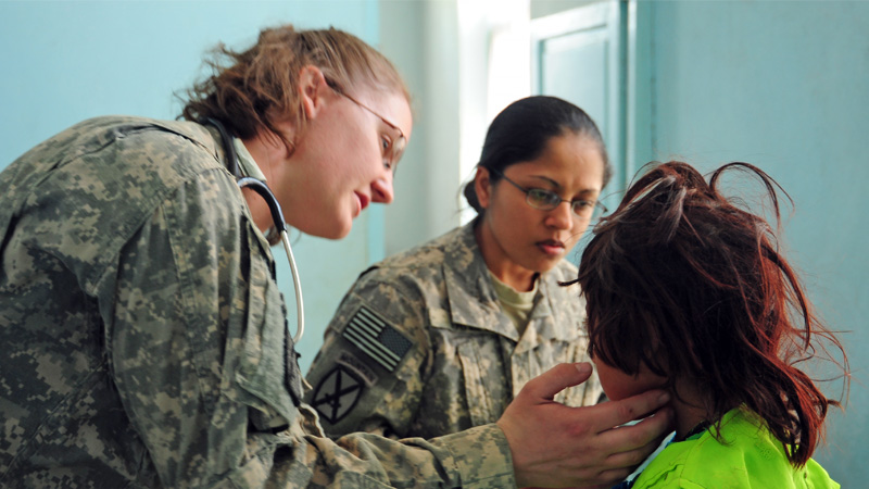 Jennifer Wheeler working with a young patient