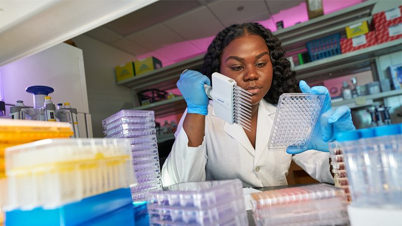 Maria Smith working in lab at St. Jude Graduate School