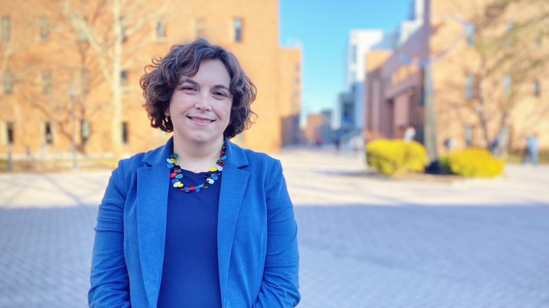 a photo of rebecca scales outdoors on campus 