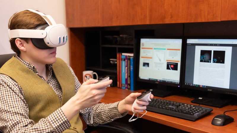 Ryan Butler wearing a virtual reality headset