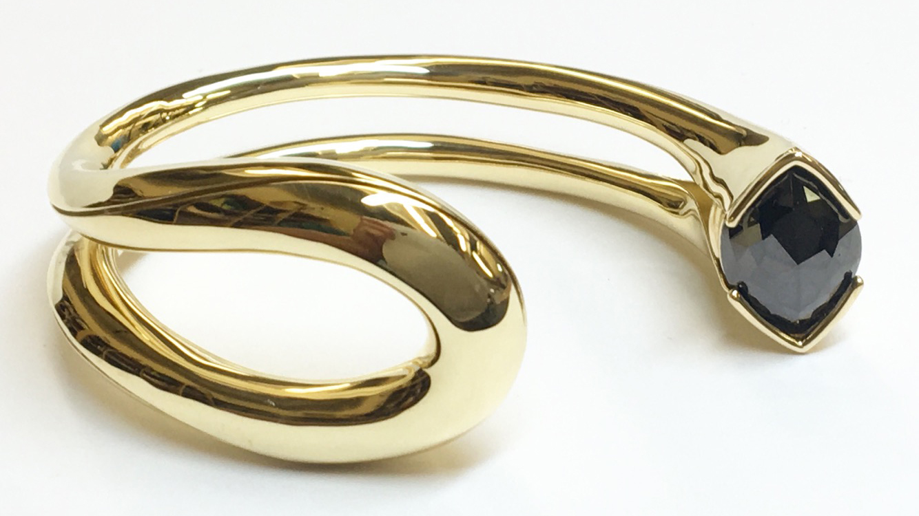 A gold jewelry design by Timo Krapf.