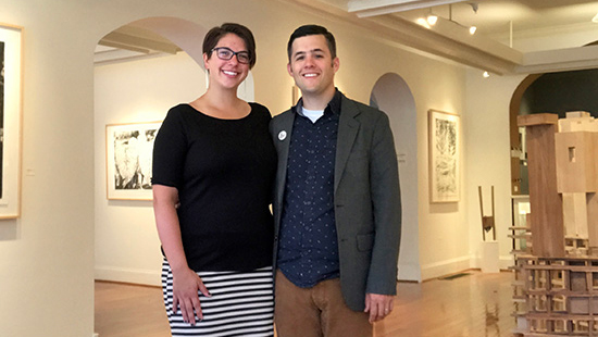 Sarah and Bradley Butler stand side-by-side in their Main Street Arts gallery.