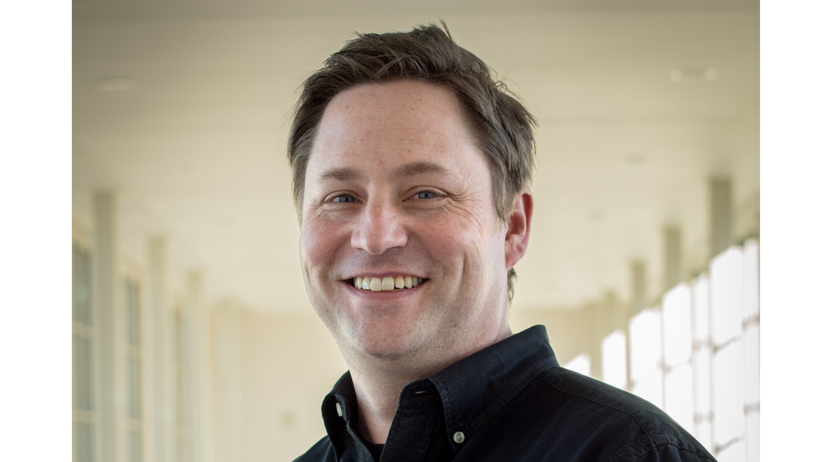 A headshot of Brian Cantwell