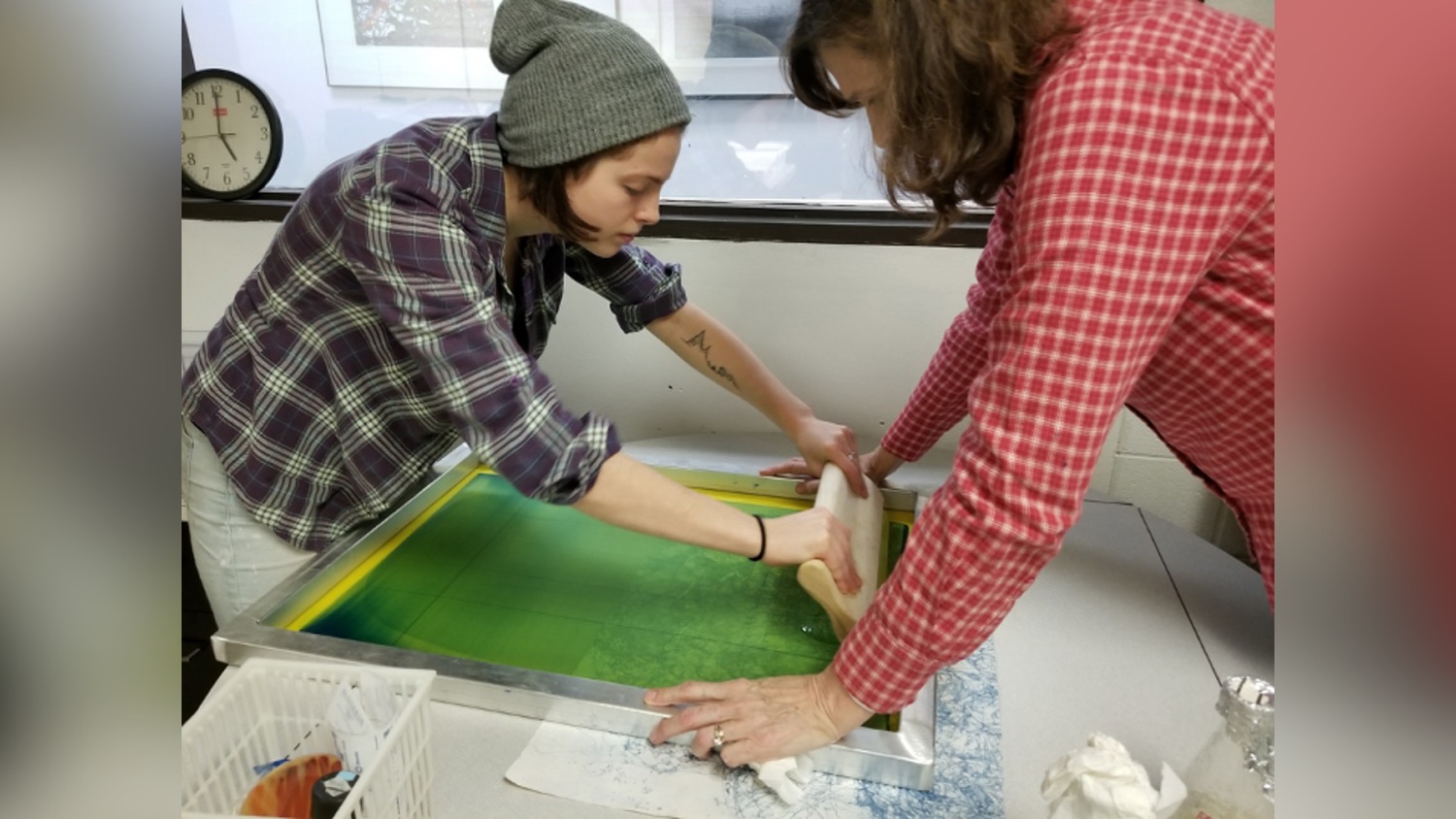 Eileen Bushnell works with student Erika McCarthy.