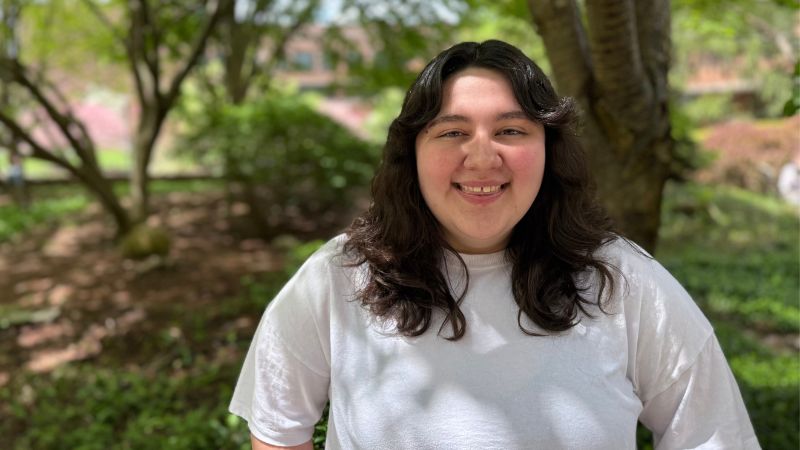 hailey standing outdoors on campus
