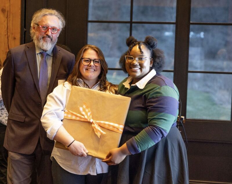 Dean Hall, Abby and Shakira as she is presented with a wrapped gift.