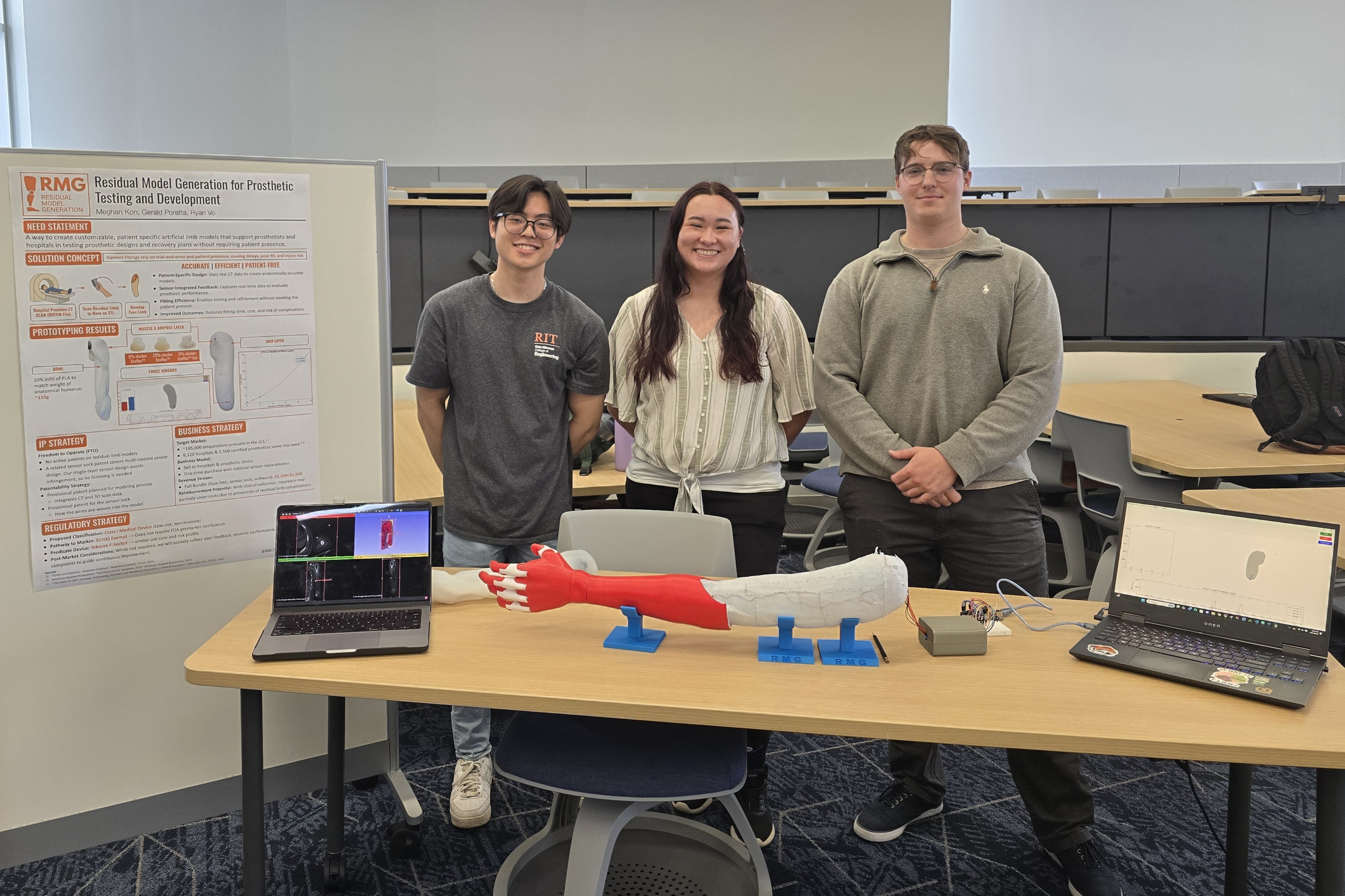 RIT Masters students, Meghan Kon, Gerald Poretta, Ryan Vo standing in front of their research poster.