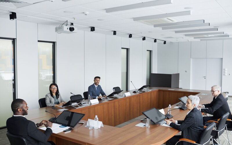 people meeting in a board room